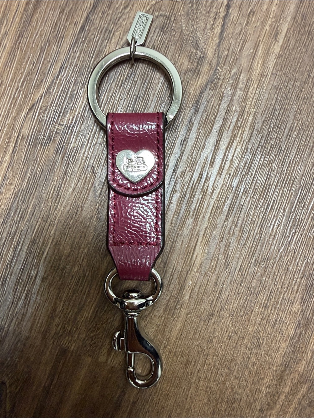 Coach Burgundy Leather Key Strap with Heart Medallion